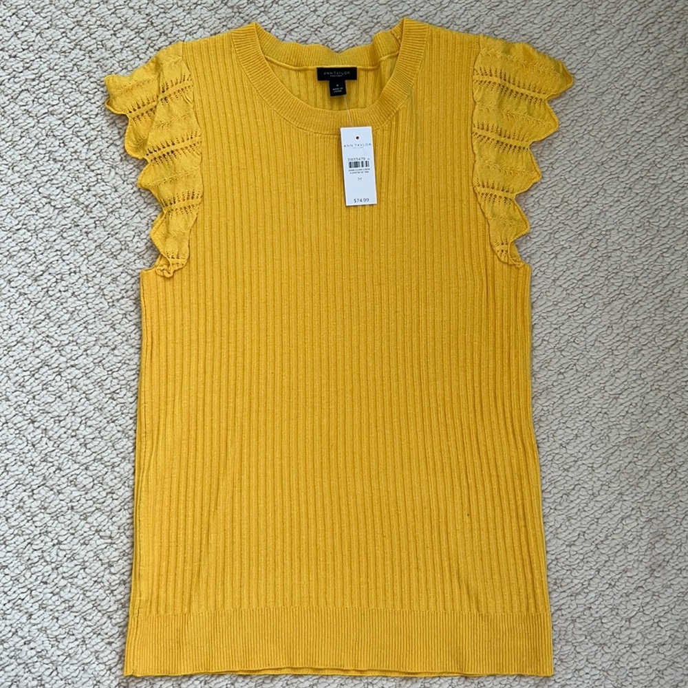 New, yellow top.